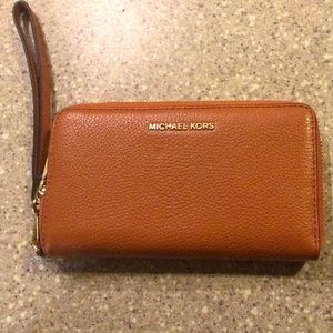 Never Used Michael Kors Orange Wristlet